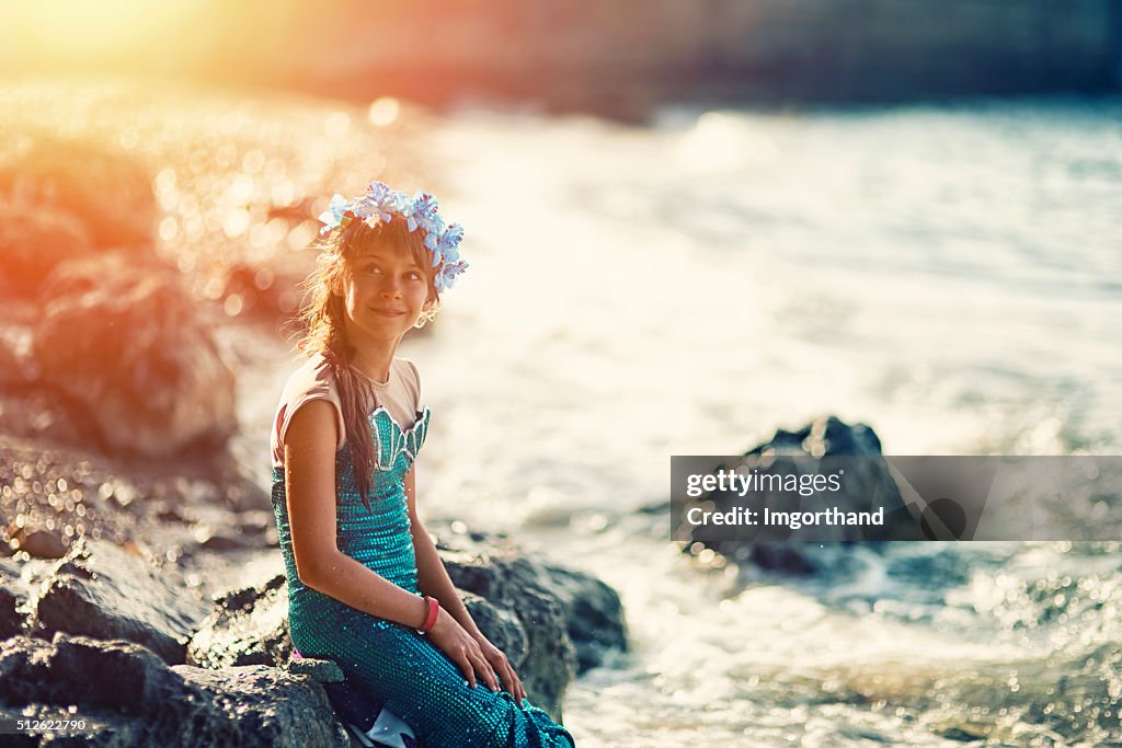 Little mermaid at the shore