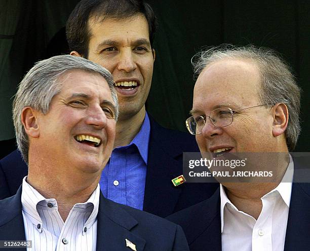 White House Chief of Staff Andrew Card , Campaign Manager Ken Mehlman and White House Senior Advisor Karl Rove speak as they join US President George...