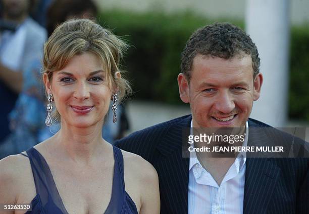 French actress Michele Laroque and actor Danny Boon arrive for the preview of Steven Spielberg's new film 'The Terminal' at the 30th Deauville...