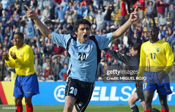 Uruguayan Carlos Bueno celebrates after scoring against Ecuador during a football match at the Centenario Stadium in Montevideo, Uruguay, 05...