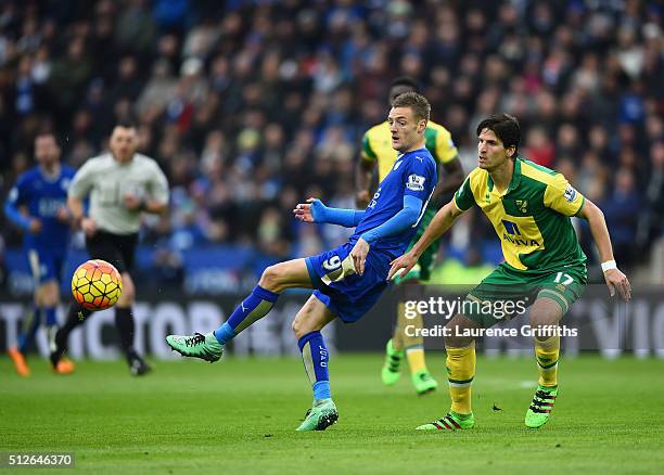 Jamie Vardy of Leicester City battles with Timm Klose of Norwich City during the Barclays Premier League match between Leicester City and Norwich...