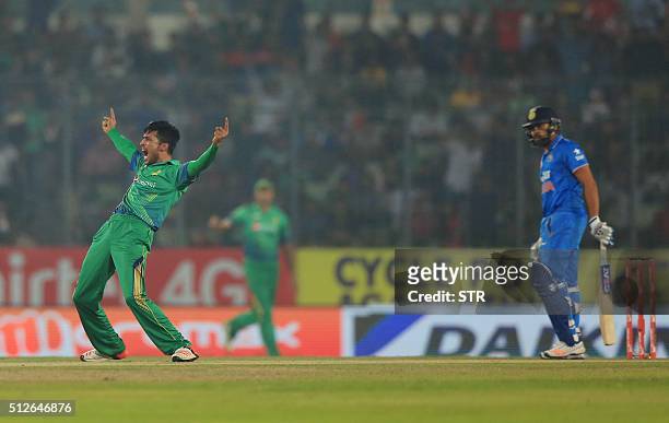 Pakistan cricketer Mohammad Amir successfully appeals for a Leg Before Wicket decision during the match between India and Pakistan at the Asia Cup...