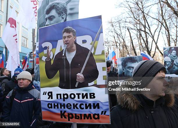 Moscovits attend a mass march marking the one-year anniversary of the killing of opposition leader Boris Nemtsov on February 27, 2016 in Moscow,...