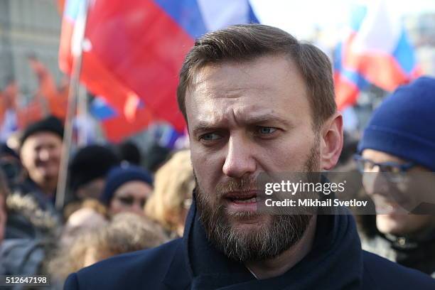 Russian opposition leader Alexei Navalny attends a mass march marking the one-year anniversary of the killing of opposition leader Boris Nemtsov on...