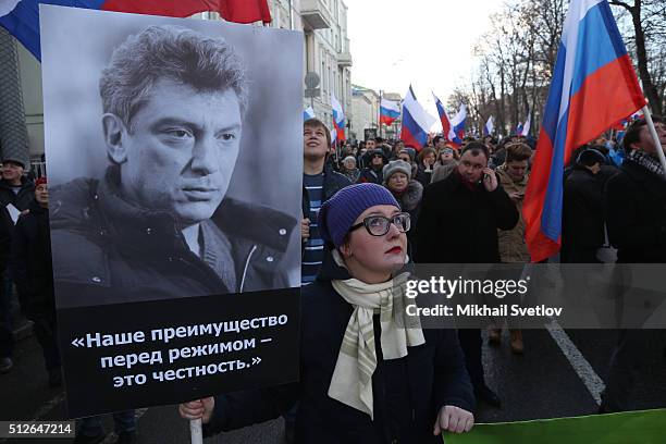 Moscovits attend a mass march marking the one-year anniversary of the killing of opposition leader Boris Nemtsov on February 27, 2016 in Moscow,...