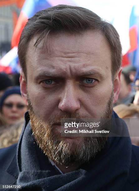 Russian opposition leader Alexei Navalny attends a mass march marking the one-year anniversary of the killing of opposition leader Boris Nemtsov on...