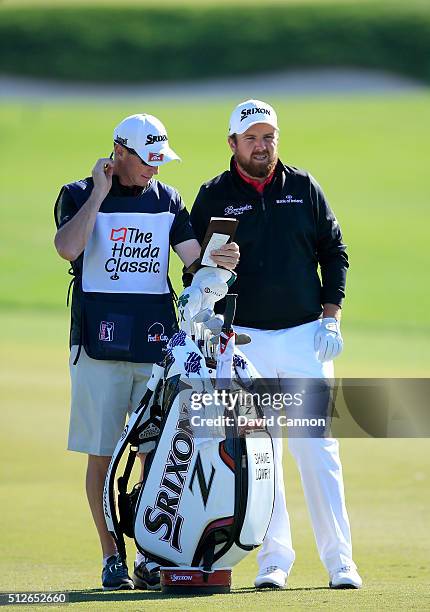 Shane Lowry of Ireland waits to play his second shot on the par 4, first hole during the third round of the 2016 Honda Classic held on the PGA...