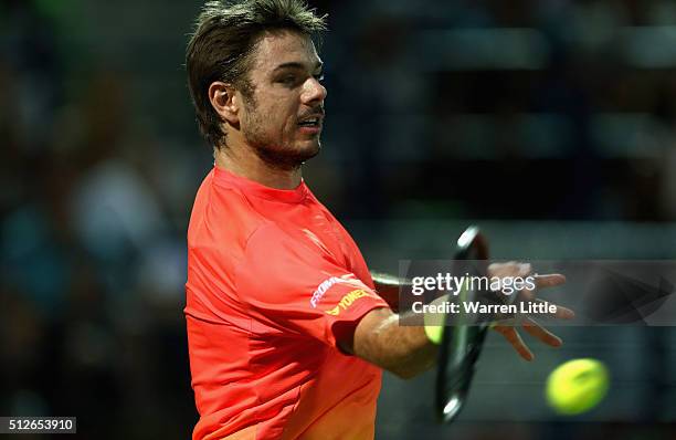 Stan Wawrinka of Switzerland in action against Marcos Baghdatis of Cyrus in the final of the ATP Dubai Duty Free Tennis Championship at the Dubai...