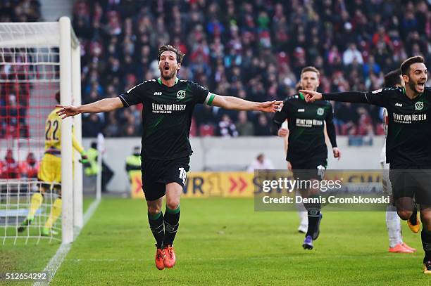 Christian Schulz of Hannover 96 celebrates as he scores their second goal during the Bundesliga match between VfB Stuttgart and Hannover 96 at...