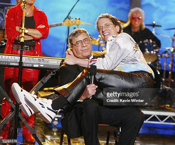 Comedian Jerry Lewis and his son, singer Gary Lewis, joke around at the 39th Annual Jerry Lewis MDA Labor Day Telethon at CBS Television City on...