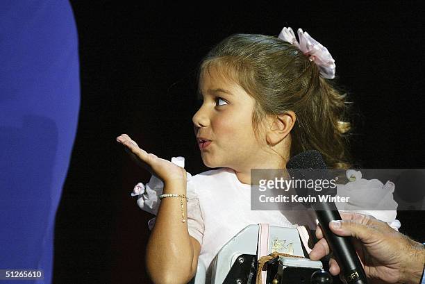 Morgan Fritz who suffers from type 2 spinal muscular atrophy, blows Jerry Lewis a kiss at the 39th Annual Jerry Lewis MDA Labor Day Telethon at CBS...