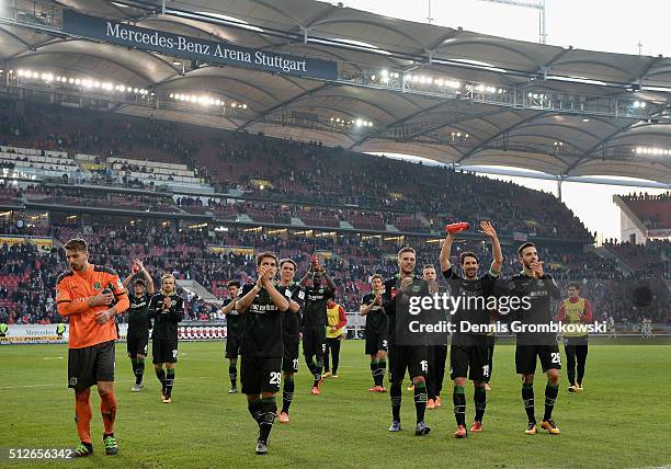 Hannover 96 players celebrate their victory in the Bundesliga match between VfB Stuttgart and Hannover 96 at Mercedes-Benz Arena on February 27, 2016...