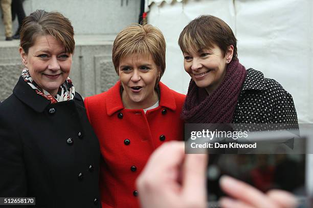 Leanne Wood, the Plaid Cymru leader, Scottish First Minister Nicola Sturgeon, and Green Party member of parliament Caroline Lucas pose for a...