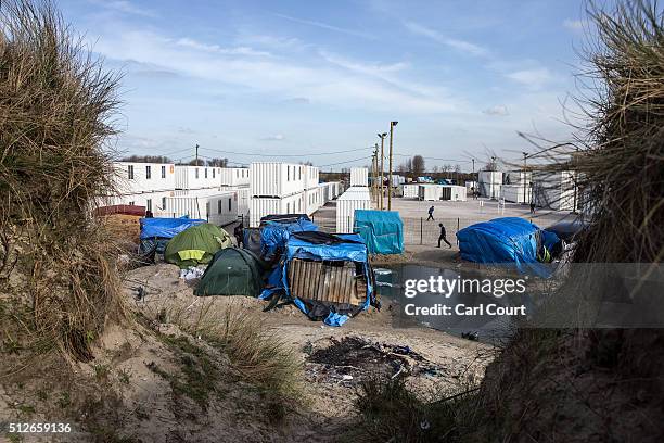 CALAIS, FRANCE Part of the old "jungle" camp is pictured next to new migrant accommodation on February 27, 2016 in Calais, France. The French...