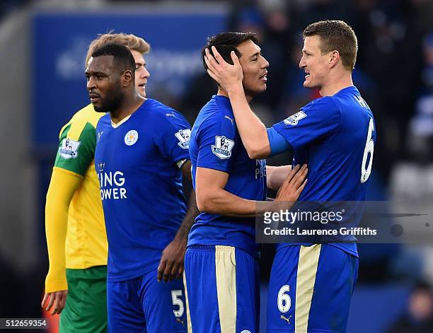 Robert Huth of Leicester City congratulates Leonardo Ulloa on his match winning goal during the Barclays Premier League match between Leicester City...