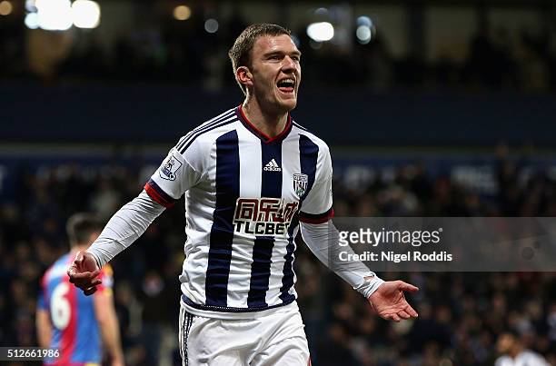 Craig Gardner of West Bromwich Albion celebrates scoring his team's first goal during the Barclays Premier League match between West Bromwich Albion...