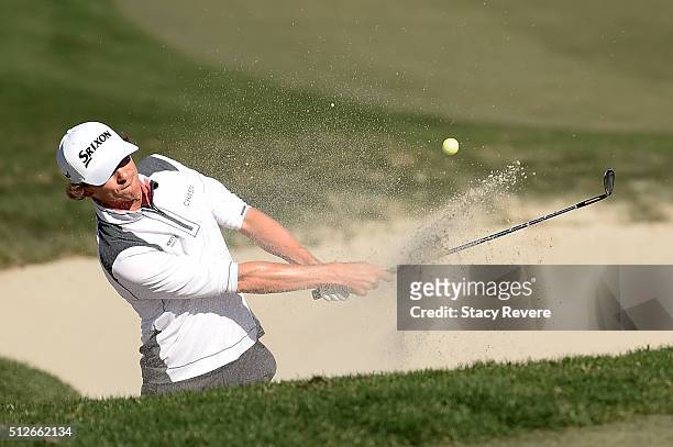 Will Wilcox of the United States hits from a green side bunker on the third hole during the third round of the Honda Classic at PGA National Resort &...