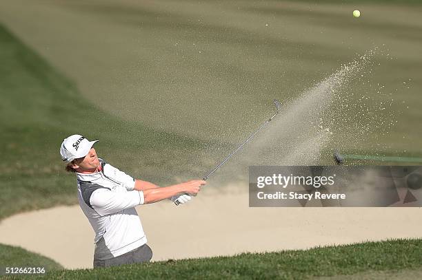 Will Wilcox of the United States hits from a green side bunker on the third hole during the third round of the Honda Classic at PGA National Resort &...