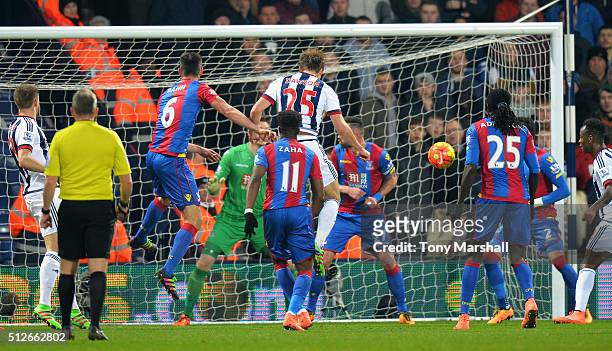 Craig Dawson of West Bromwich Albion heads the ball to score his team's second goal during the Barclays Premier League match between West Bromwich...