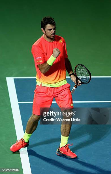 Stan Wawrinka of Switzerland celebrates a point against Marcos Baghdatis of Cyrus in the final of the ATP Dubai Duty Free Tennis Championship at the...