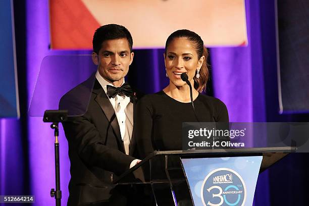 Actor Nick Gonzalez and tv personality Jackie Guerrido onstage during the 19th Annual National Hispanic Media Coalition Impact Awards Gala at Regent...