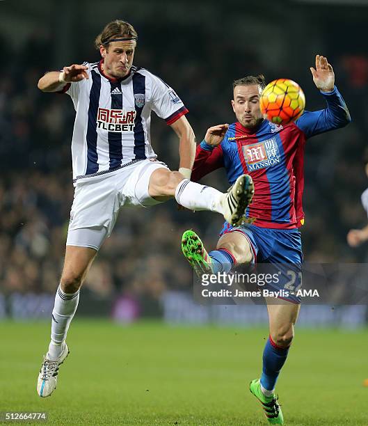 Jonas Olsson of West Bromwich Albion and Jordon Mutch of Crystal Palace during the Barclays Premier League match between West Bromwich Albion and...