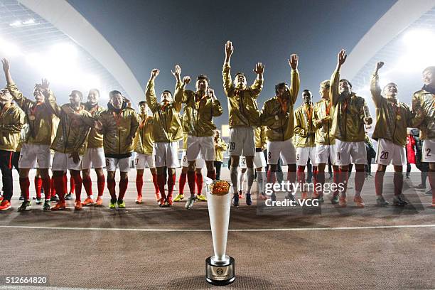 Guangzhou Evergrande celebrates on award ceremony as they wins Jiangsu Suning during the 2016 CFA Super Cup between Guangzhou Evergrande FC and...