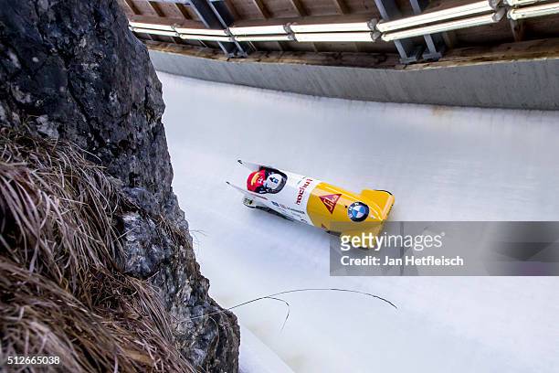 Pilot Rico Peter and his pusher Janne Bror van der Zijde of Switzerland compete during the first run of the IBSF Bobsleigh & Skeleton World Cup on...