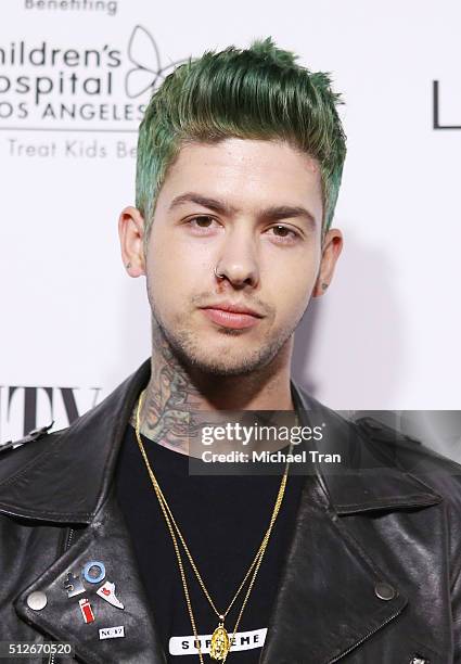 Travis Mills arrives at the Vanity Fair pre-Oscar party held at Palihouse Holloway on February 26, 2016 in West Hollywood, California.