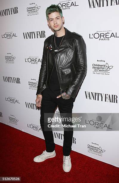 Travis Mills arrives at the Vanity Fair pre-Oscar party held at Palihouse Holloway on February 26, 2016 in West Hollywood, California.