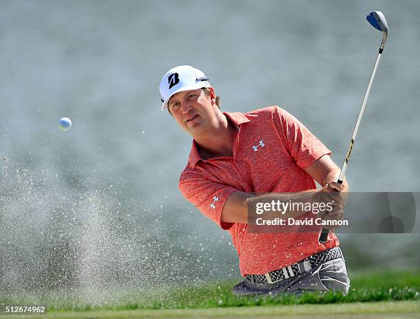 Hudson Swafford of the United States plays his third shot on the par 4, first hole during the third round of the 2016 Honda Classic held on the PGA...