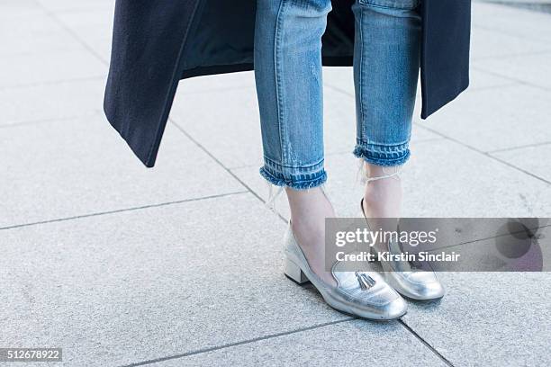 Barneys New York assistant fashion director Hannah Bibb wears Saint Laurent shoes on day 4 during London Fashion Week Autumn/Winter 2016/17 on...