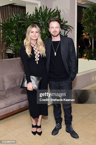 Lauren Parsekian and Aaron Paul attend an intimate dinner celebrating Chopard's Journey to Sustainable Luxury hosted by Colin & Livia Firth and...