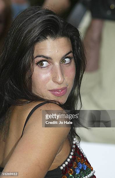 Amy Winehouse arrives at the annual "Nationwide Mercury Music Prize" at the Grosvenor House on September 7, 2004 in London. Making the 12-album...