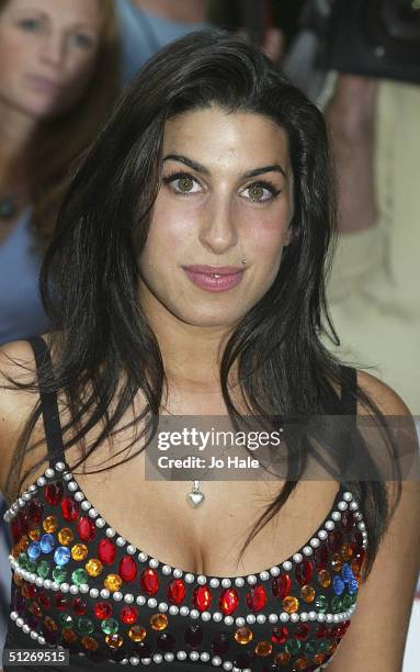 Amy Winehouse arrives at the annual "Nationwide Mercury Music Prize" at the Grosvenor House on September 7, 2004 in London. Making the 12-album...