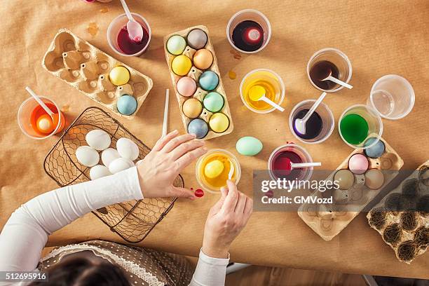 coloring easter eggs with natural dye - easter coloring stock pictures, royalty-free photos & images