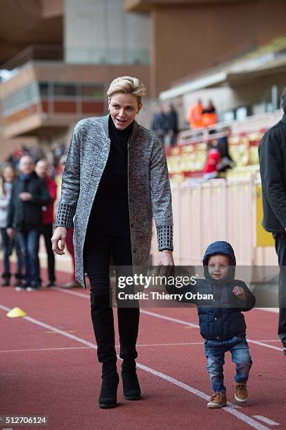 Princess Charlene of Monaco and Prince Jacques of Monaco attend the 6th Sainte Devote Rugby Tournament at Stade Louis II on February 27, 2016 in...