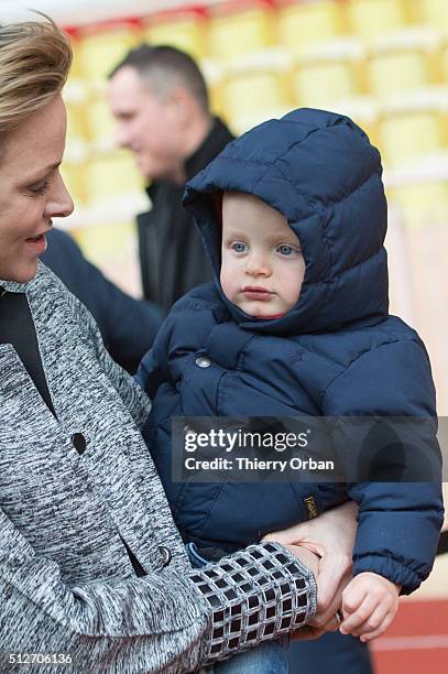 Princess Charlene of Monaco and Prince Jacques attend the 6th Sainte Devote Rugby Tournament at Stade Louis II on February 27, 2016 in Monaco, Monaco.