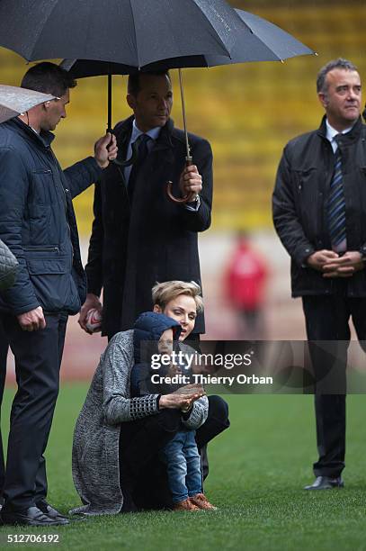 Princess Charlene of Monaco and Prince Jacques attend the 6th Sainte Devote Rugby Tournament at Stade Louis II on February 27, 2016 in Monaco, Monaco.