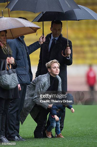 Princess Charlene of Monaco and Prince Jacques attend the 6th Sainte Devote Rugby Tournament at Stade Louis II on February 27, 2016 in Monaco, Monaco.