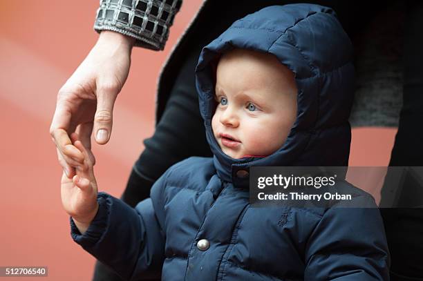 Princess Charlene of Monaco and Prince Jacques attend the 6th Sainte Devote Rugby Tournament at Stade Louis II on February 27, 2016 in Monaco, Monaco.