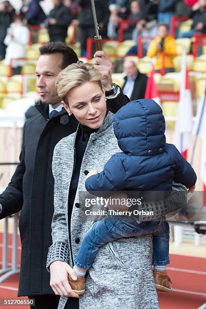 Princess Charlene of Monaco and Prince Jacques attend the 6th Sainte Devote Rugby Tournament at Stade Louis II on February 27, 2016 in Monaco, Monaco.