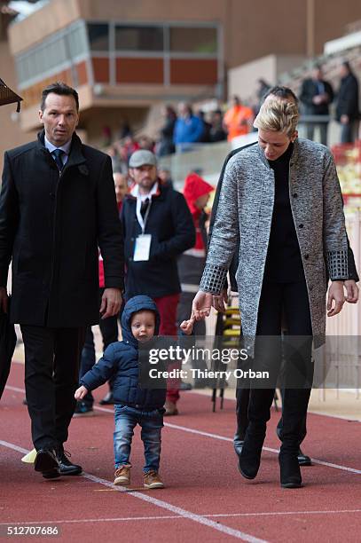 Princess Charlene of Monaco and Prince Jacques attend the 6th Sainte Devote Rugby Tournament at Stade Louis II on February 27, 2016 in Monaco, Monaco.