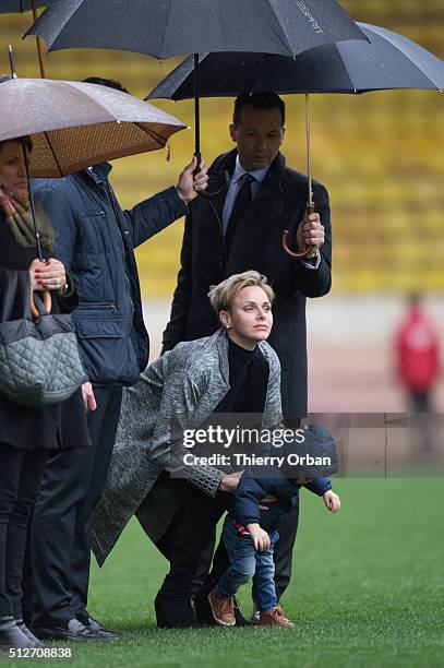 Princess Charlene of Monaco and Prince Jacques attend the 6th Sainte Devote Rugby Tournament at Stade Louis II on February 27, 2016 in Monaco, Monaco.