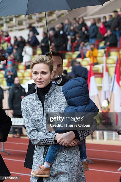 Princess Charlene of Monaco and Prince Jacques attend the 6th Sainte Devote Rugby Tournament at Stade Louis II on February 27, 2016 in Monaco, Monaco.