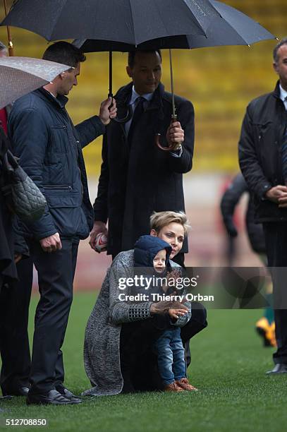 Princess Charlene of Monaco and Prince Jacques attend the 6th Sainte Devote Rugby Tournament at Stade Louis II on February 27, 2016 in Monaco, Monaco.