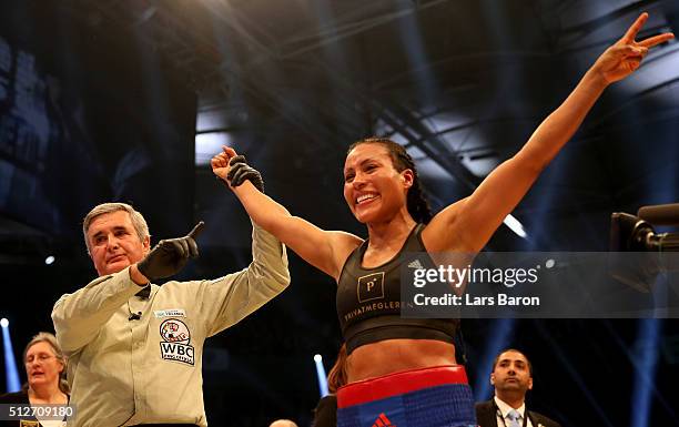 Cecilia Braekhus celebrates after her Welterweight World Championship fight against Chris Namus prior to the IBO Cruiserweight World Championship...