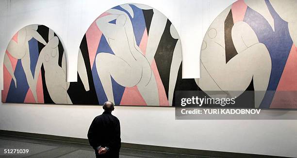 Visitor looks at Henri Matisse painting "Paris Dance", exhibited at Pushkin State Fine Arts museum in Moscow, 08 September 2004. Moscow industrialist...