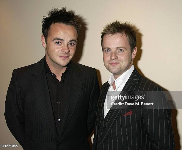 Presenters Anthony McPartlin and Declan Donnelly pose in the pressroom at the "GQ Men Of The Year Awards" at the Royal Opera House on September 7,...