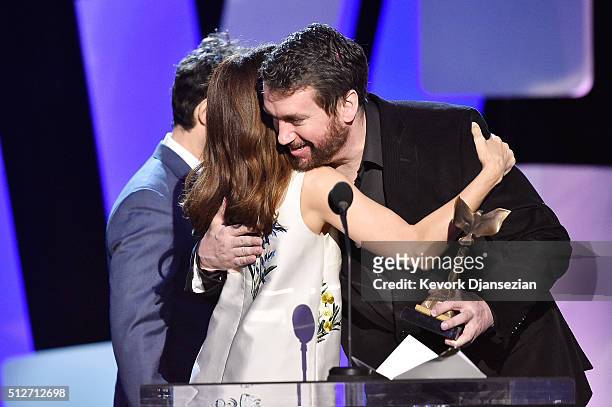 Editor Tom McArdle accepts the Best Editing award for 'Spotlight' from actors Jay Duplass and Marisa Tomei onstage during the 2016 Film Independent...